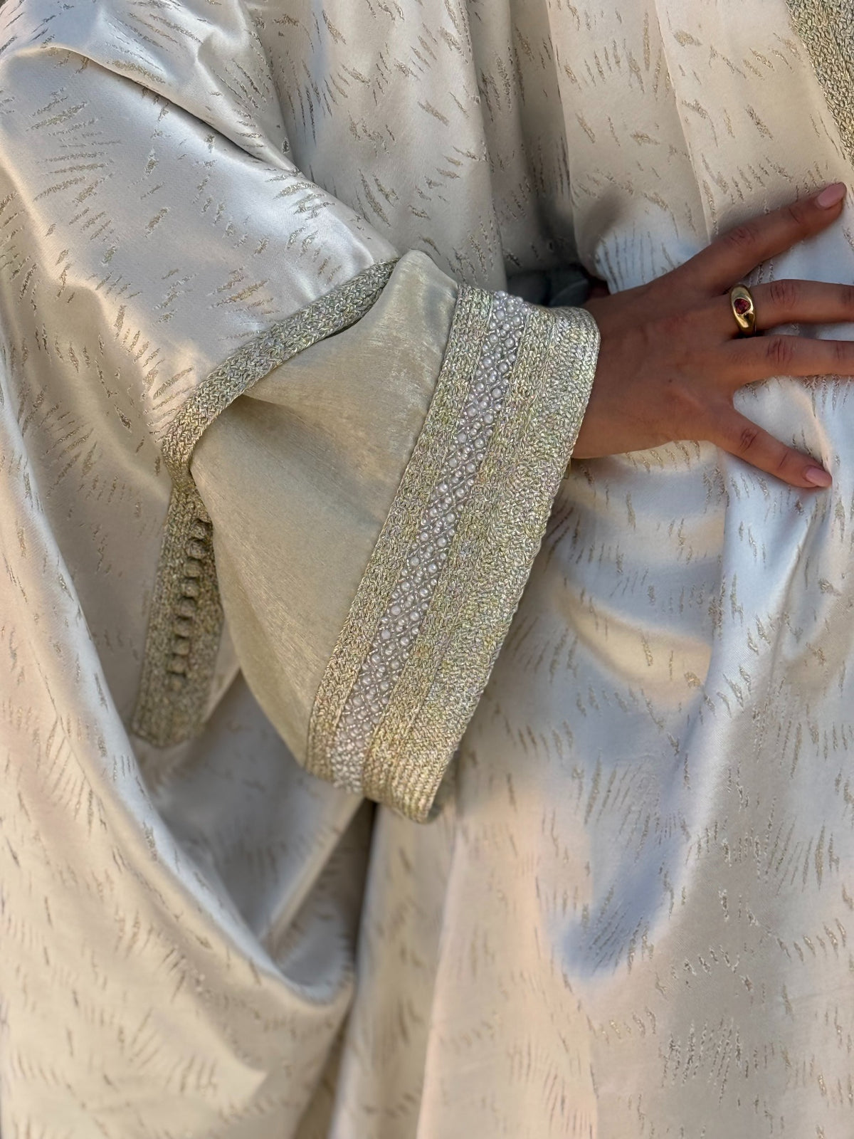 Esme two-piece Kaftan in cream — trim detail