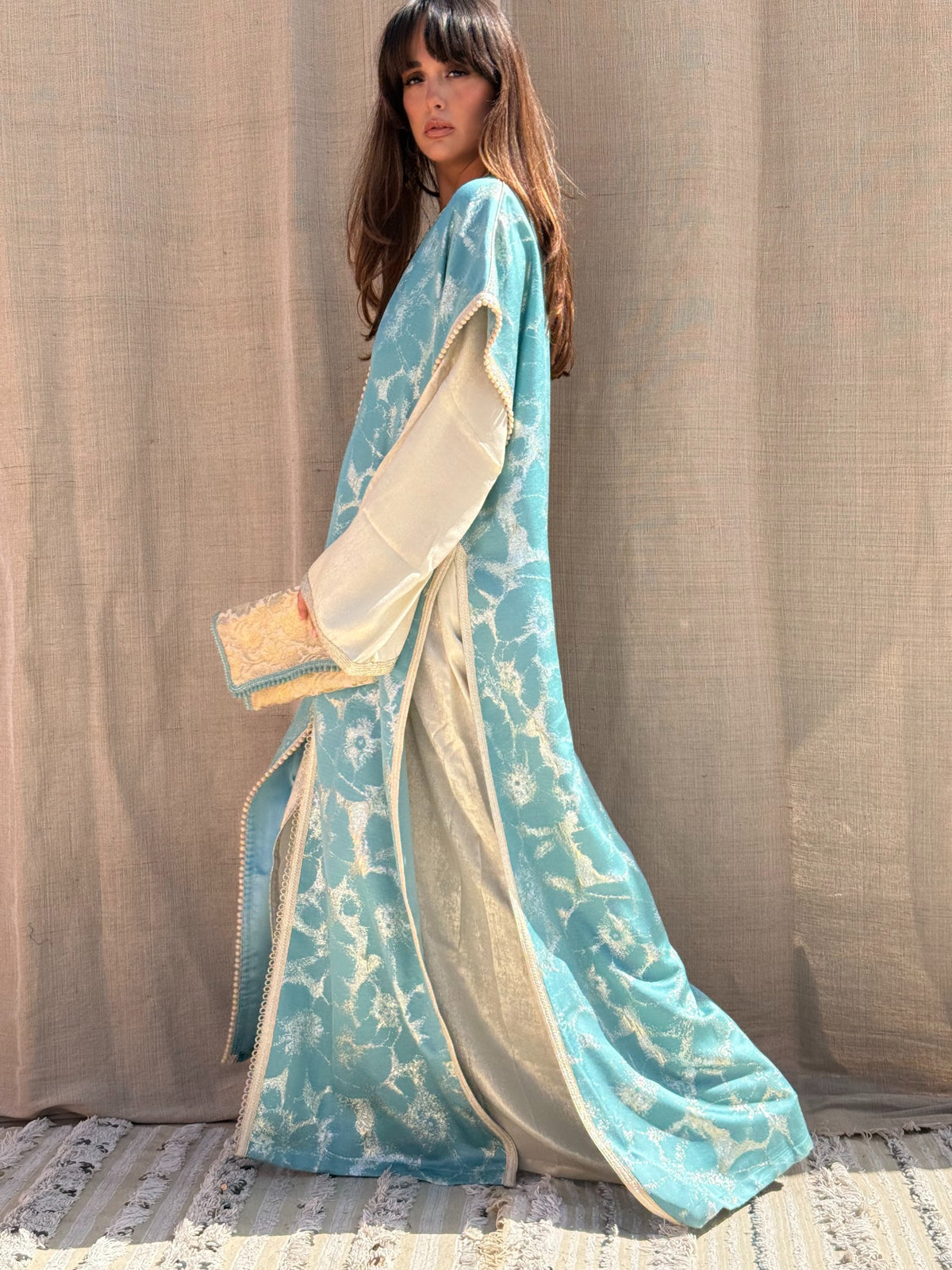 Loubna kaftan flowing silhouette, side view