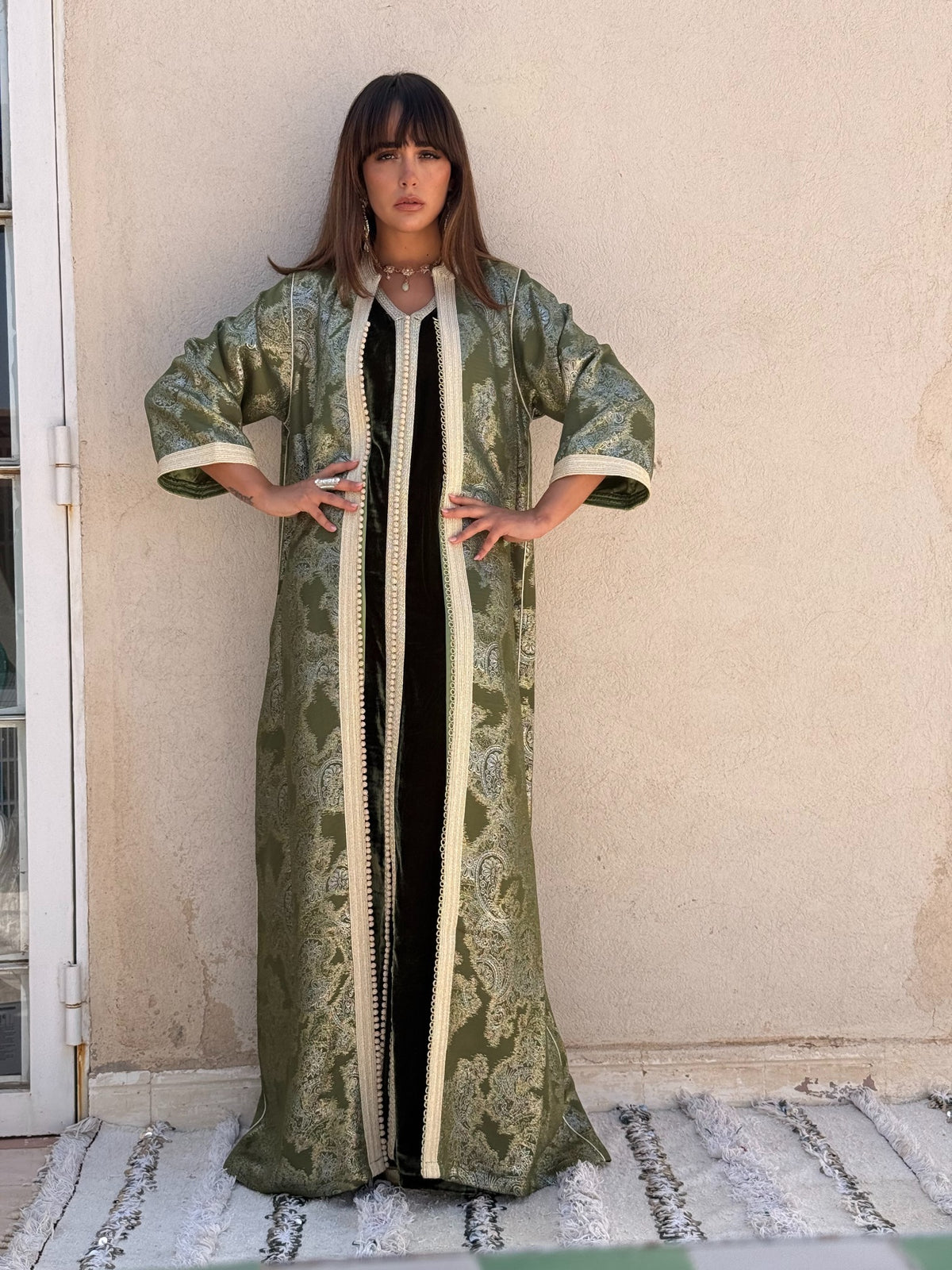 Hinda green patterned kaftan with cream trim, full front view