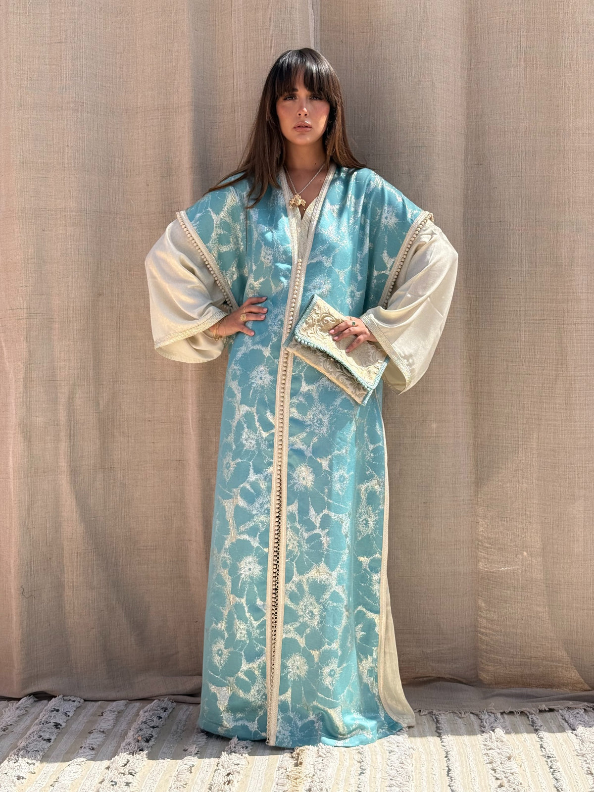Loubna blue patterned kaftan with cream sleeves, full front view